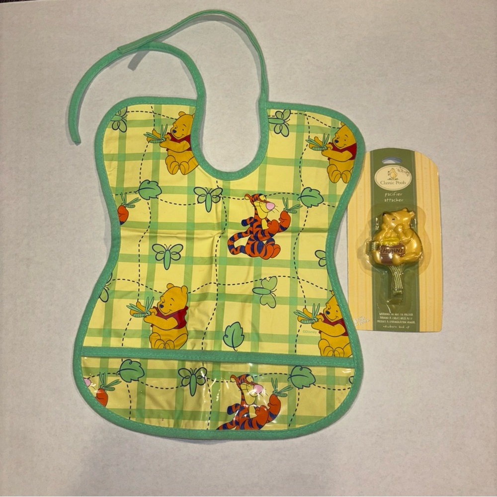 Winnie the Pooh Baby Bib with Green Trim and pacifier clip